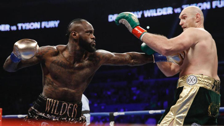 Deontay Wilder with Tyson Fury