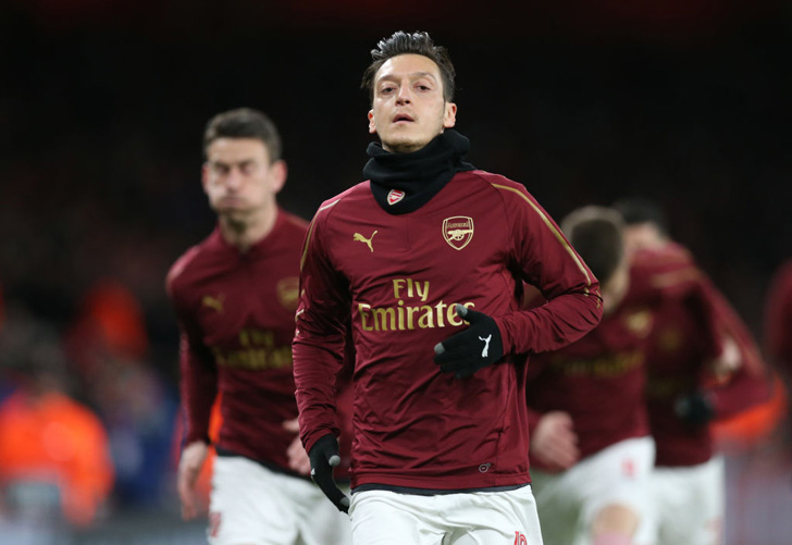 Mesut Ozil in action for Arsenal.