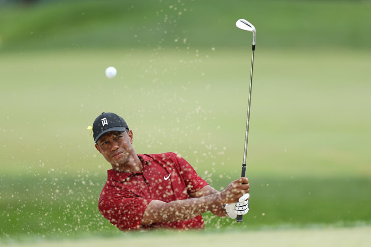 Tiger Woods in action. Tiger Woods in action.