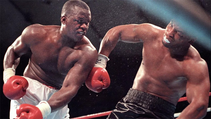 Boxing: Buster Douglas KO’s Mike Tyson